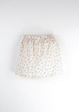 Skirt with pink textured pocket